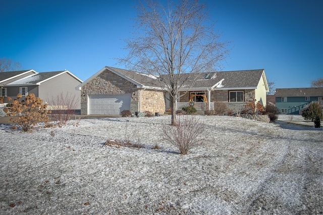 ranch-style house featuring a garage