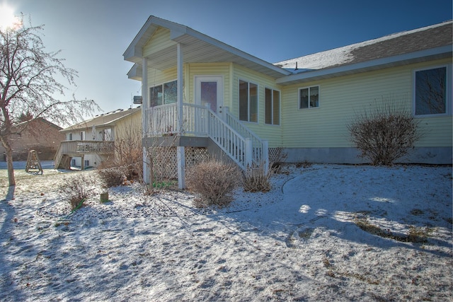 view of snow covered property