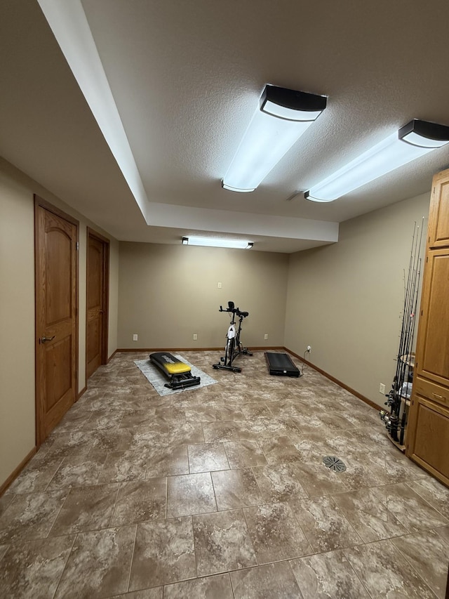 basement with a textured ceiling