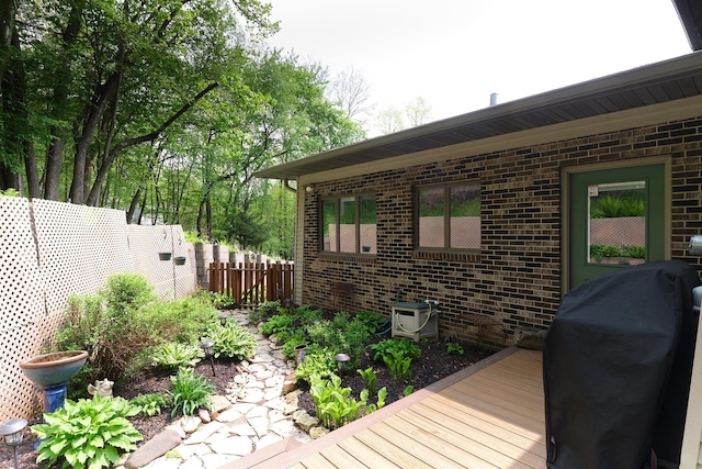 exterior space featuring a wooden deck