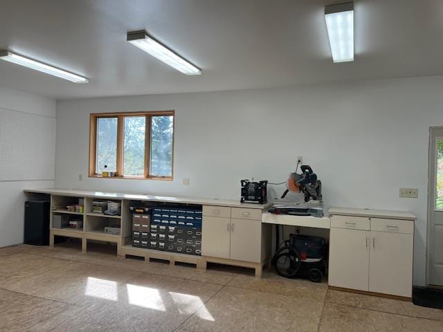 interior space featuring white cabinets