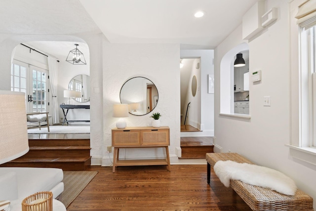 living area with dark hardwood / wood-style floors