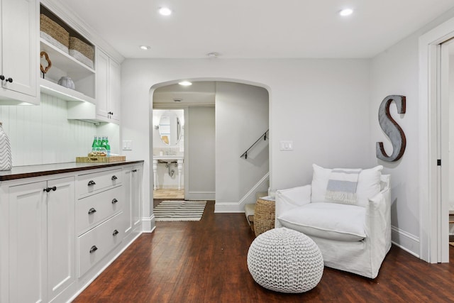 living area featuring dark hardwood / wood-style flooring