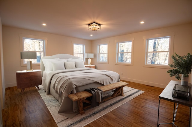 bedroom featuring dark wood-type flooring