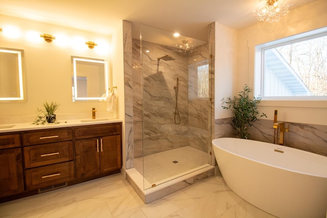 bathroom featuring plus walk in shower and vanity