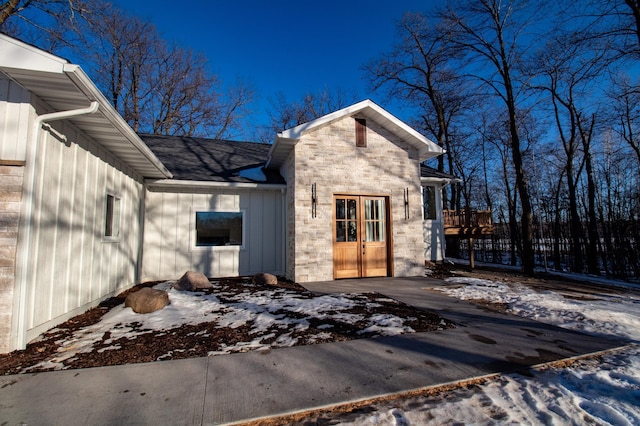 view of snow covered property