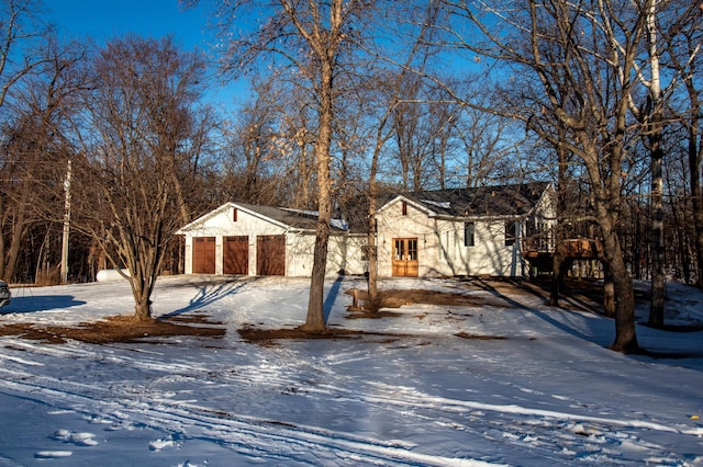 ranch-style home with a garage