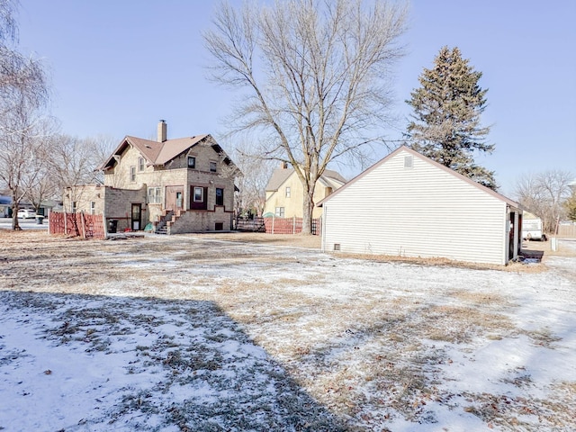 view of yard covered in snow