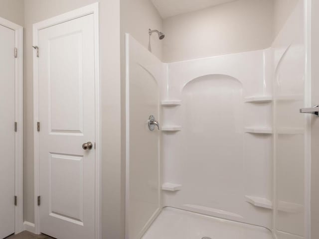 bathroom featuring walk in shower