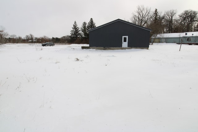 view of yard covered in snow