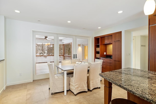 dining area featuring light tile patterned floors