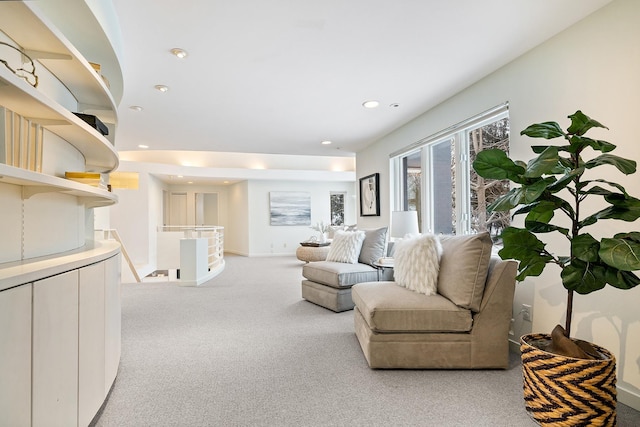 living room featuring light carpet