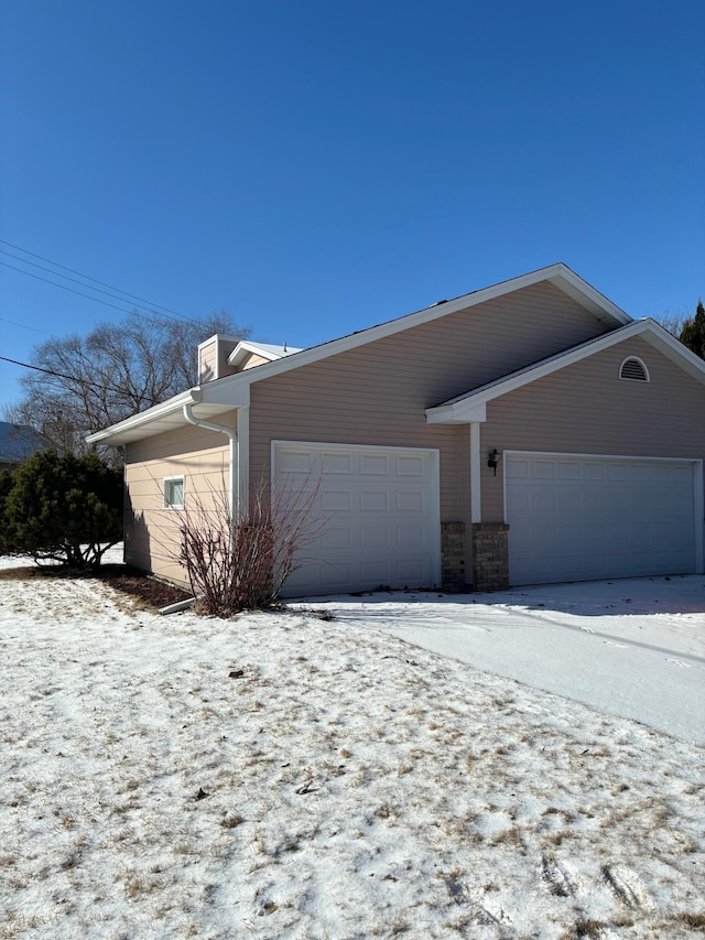 exterior space featuring a garage