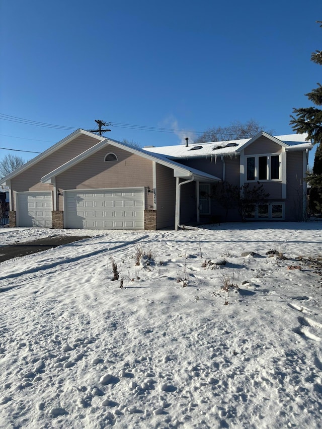 view of front of home with a garage