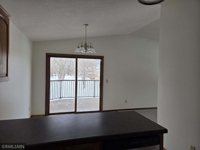 unfurnished dining area featuring a chandelier, vaulted ceiling, and a textured ceiling