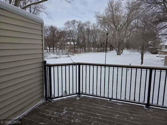 view of snow covered deck