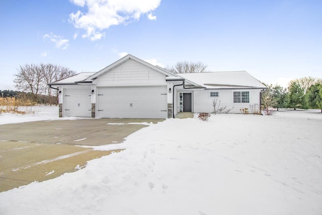 ranch-style home with a garage