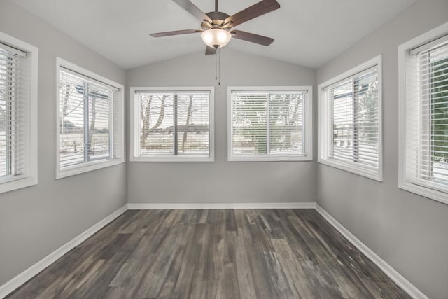 unfurnished sunroom featuring ceiling fan, plenty of natural light, and vaulted ceiling