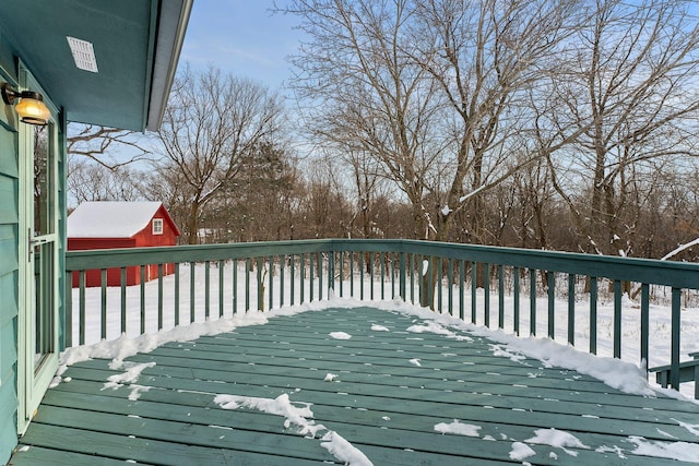 view of snow covered deck