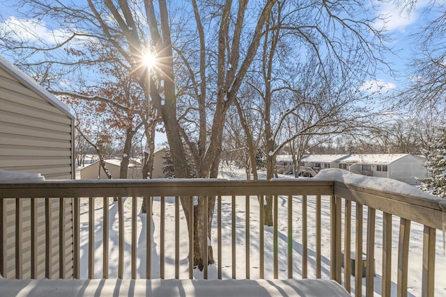 view of snow covered deck