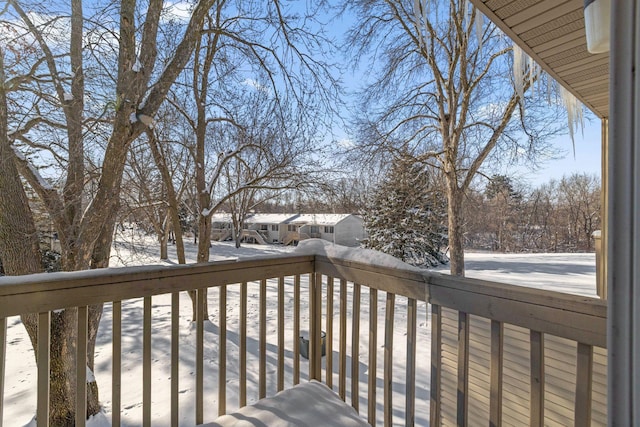 view of snow covered deck