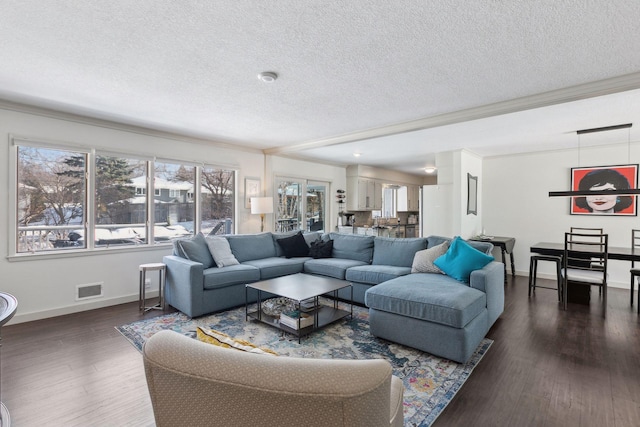 living room featuring dark wood-type flooring and a textured ceiling