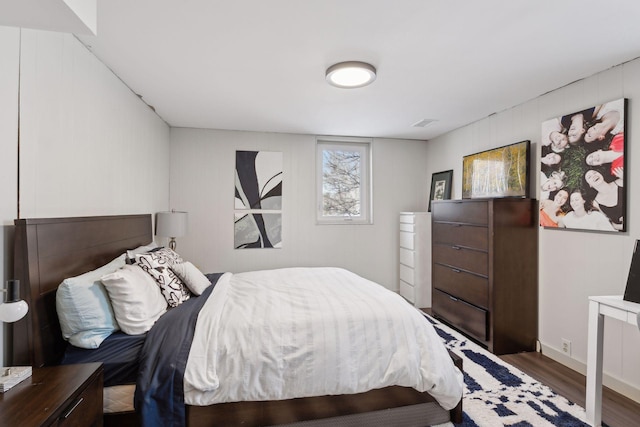 bedroom featuring wood-type flooring