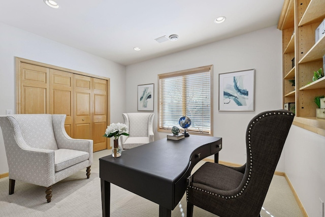 office area with recessed lighting, light colored carpet, and baseboards