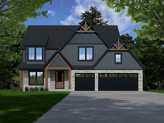 view of front of home with a garage and a front yard