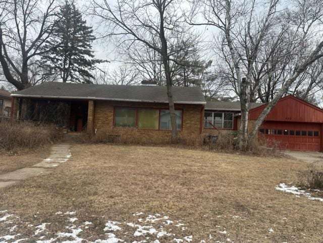 single story home featuring a garage