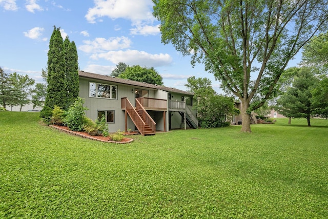 1541 2nd Ave SE, Cambridge, MN 55008 - rear view of property with stairway and a yard