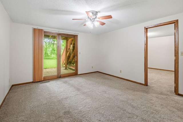 1541 2nd Ave SE, Cambridge, MN 55008 - carpeted empty room featuring a ceiling fan and a textured ceiling