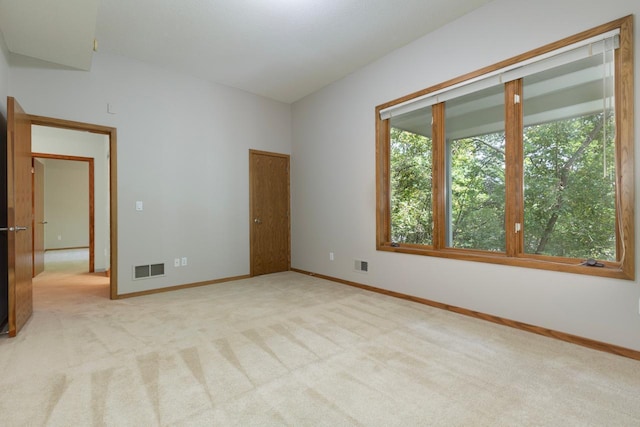 view of carpeted spare room