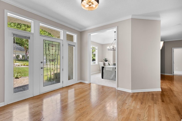 6229 Morningside Cir, Eden Prairie, MN 55344 - entryway with a chandelier, wood finished floors, and crown molding