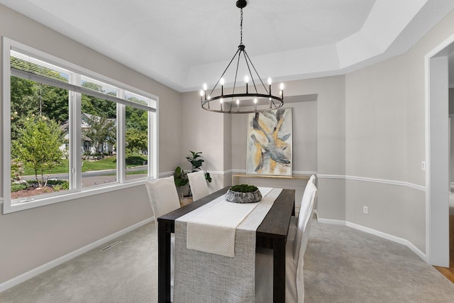 6229 Morningside Cir, Eden Prairie, MN 55344 - carpeted dining area with a chandelier and a raised ceiling