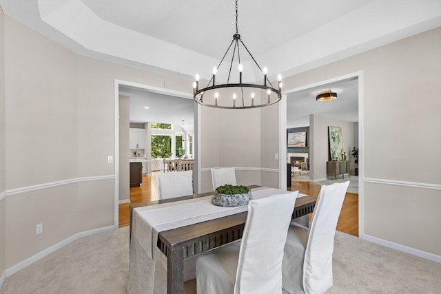 6229 Morningside Cir, Eden Prairie, MN 55344 - dining room with a chandelier, light carpet, and a tray ceiling