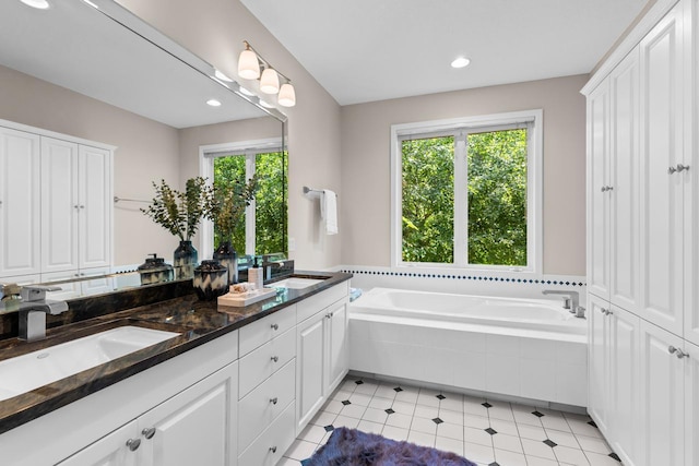 6229 Morningside Cir, Eden Prairie, MN 55344 - full bathroom with double vanity, a garden tub, tile patterned flooring, and recessed lighting