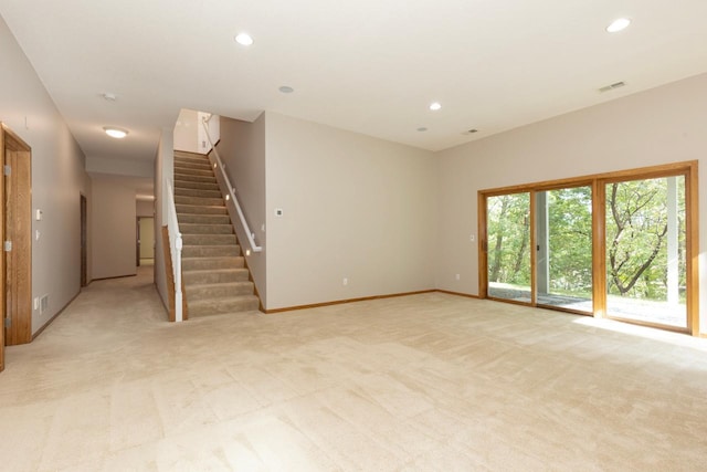 6229 Morningside Cir, Eden Prairie, MN 55344 - unfurnished living room with light carpet, stairs, and recessed lighting