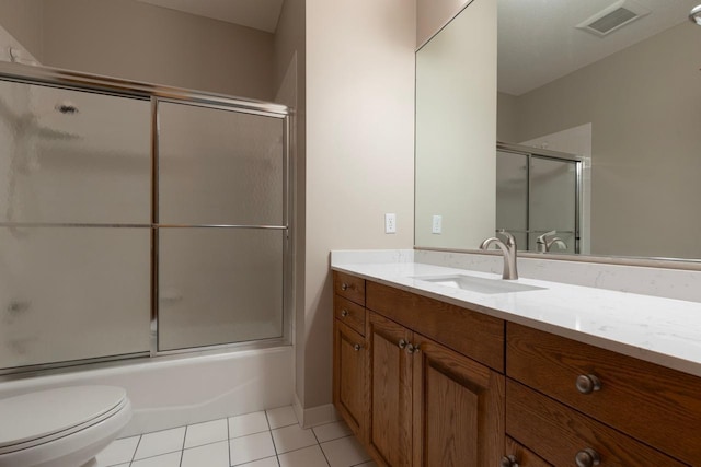 6229 Morningside Cir, Eden Prairie, MN 55344 - full bath with vanity, tile patterned flooring, and combined bath / shower with glass door
