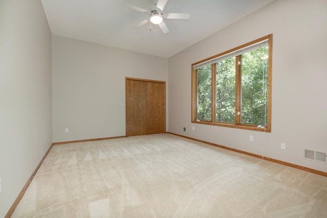 6229 Morningside Cir, Eden Prairie, MN 55344 - unfurnished bedroom featuring light colored carpet, a closet, and ceiling fan