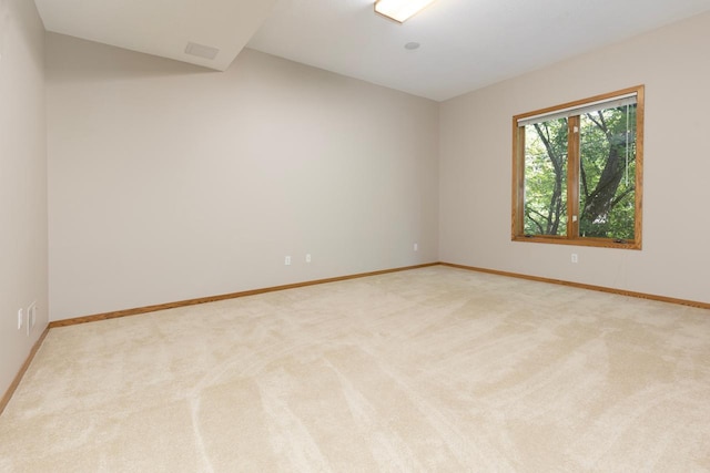6229 Morningside Cir, Eden Prairie, MN 55344 - empty room featuring light colored carpet and vaulted ceiling