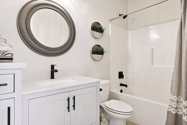 bathroom with toilet, shower / bath combination with curtain, and vanity