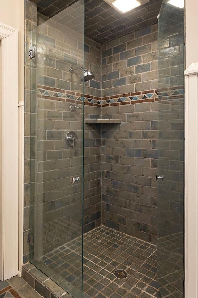 bathroom featuring a stall shower