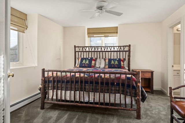 bedroom with a ceiling fan, carpet, a baseboard heating unit, and baseboards