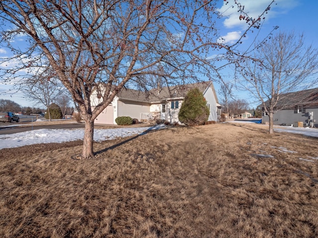 exterior space with a front yard