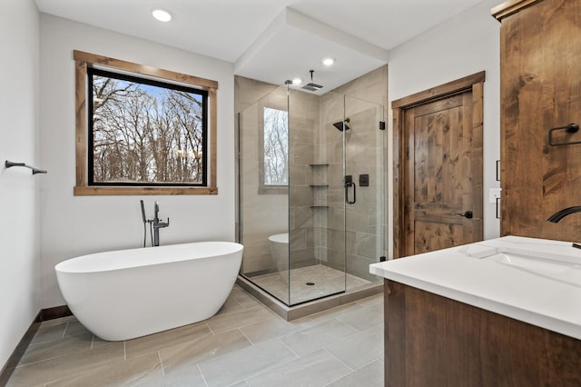 bathroom featuring independent shower and bath and vanity