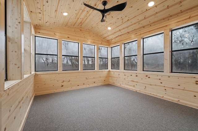 unfurnished sunroom featuring lofted ceiling, wooden ceiling, and ceiling fan