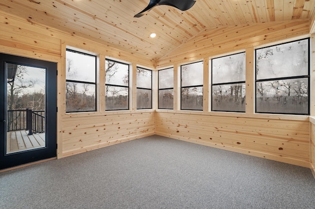 unfurnished sunroom featuring lofted ceiling, wood ceiling, and ceiling fan