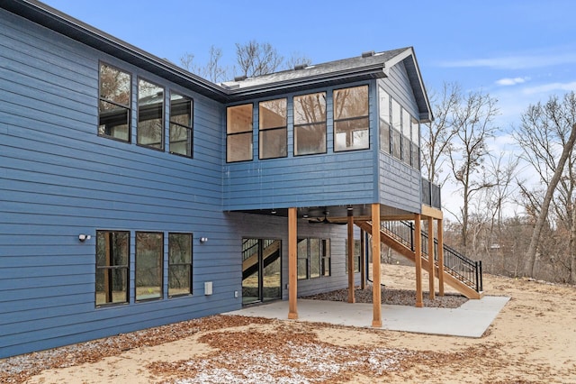 rear view of house featuring a patio area