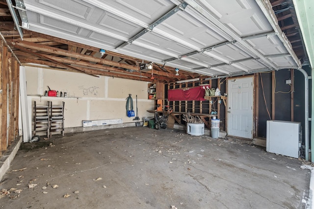 818 Sherburne Ave, Saint Paul, MN 55104 - garage featuring a garage door opener